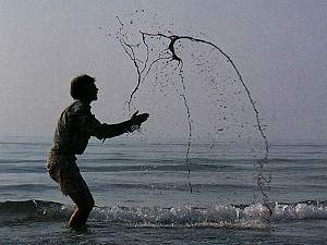 Wet sand cupped, squeezed, thrown out of water. Photograph by Judith Goldsworthy